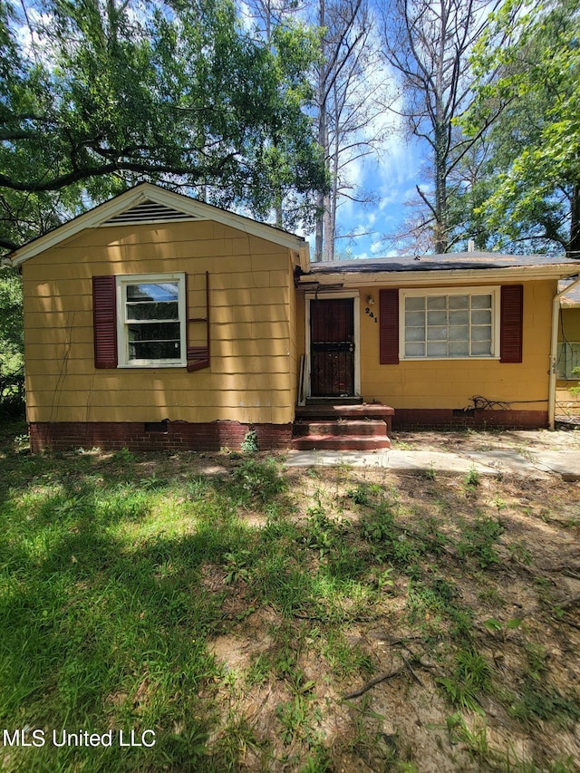 view of front of home with crawl space