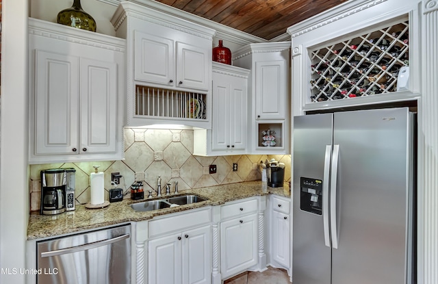 521 Heyward Ln, Madison, MS 39110 - kitchen with appliances with stainless steel finishes, a sink, white cabinetry, tasteful backsplash, and wooden ceiling