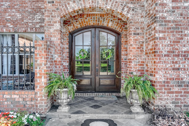 521 Heyward Ln, Madison, MS 39110 - property entrance with french doors and brick siding