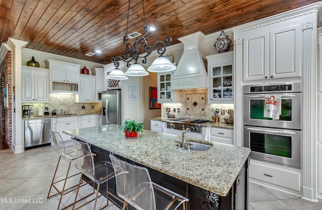 521 Heyward Ln, Madison, MS 39110 - kitchen featuring appliances with stainless steel finishes, wooden ceiling, light tile patterned flooring, a sink, and white cabinetry