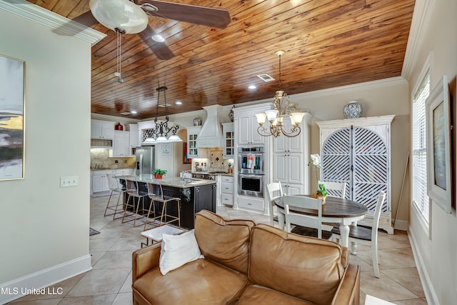 521 Heyward Ln, Madison, MS 39110 - living room with wooden ceiling, a chandelier, light tile patterned floors, baseboards, and ornamental molding