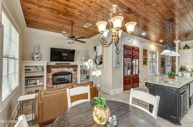 521 Heyward Ln, Madison, MS 39110 - dining space with wooden ceiling, crown molding, light tile patterned floors, ceiling fan, and baseboards