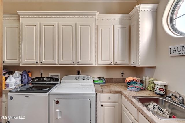 521 Heyward Ln, Madison, MS 39110 - laundry room with washing machine and clothes dryer and cabinet space