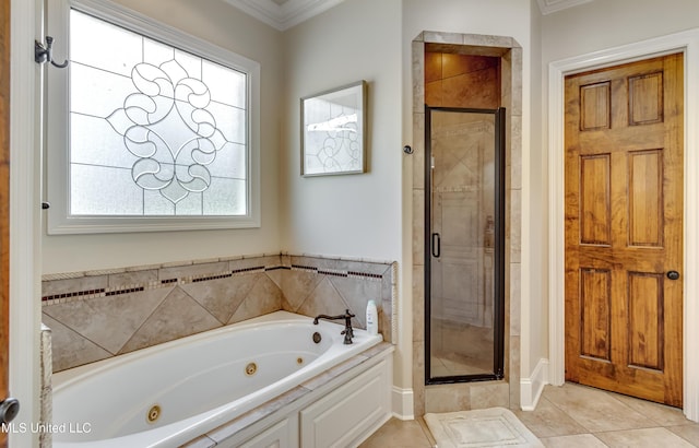 521 Heyward Ln, Madison, MS 39110 - bathroom featuring a whirlpool tub, a stall shower, ornamental molding, and tile patterned flooring