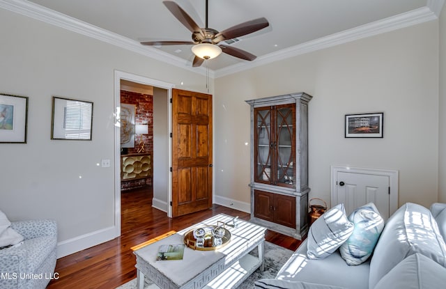 521 Heyward Ln, Madison, MS 39110 - living room featuring a ceiling fan, crown molding, dark wood finished floors, and baseboards