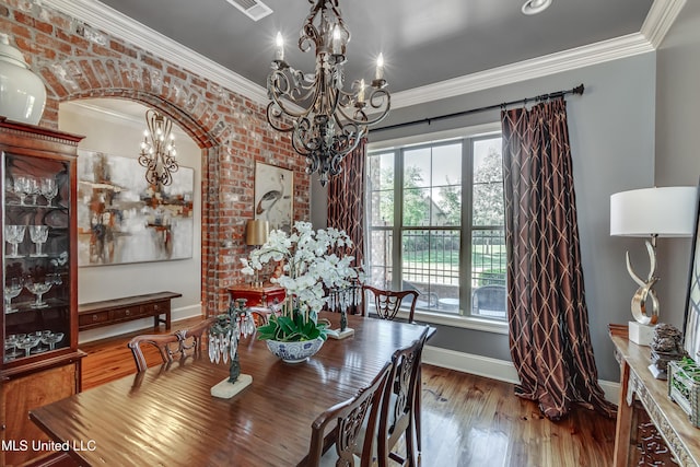 521 Heyward Ln, Madison, MS 39110 - dining room featuring a chandelier, plenty of natural light, baseboards, and ornamental molding