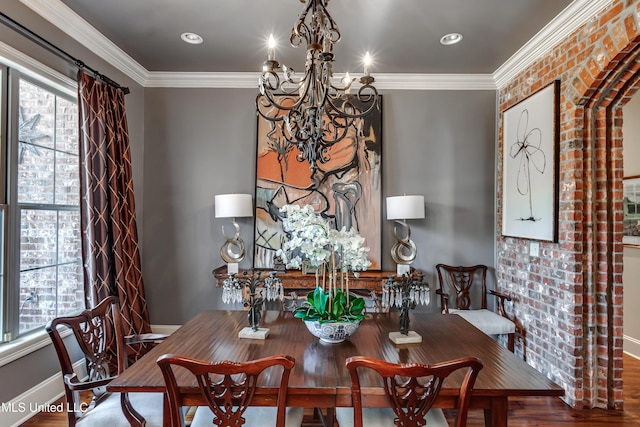 521 Heyward Ln, Madison, MS 39110 - dining room featuring a chandelier, plenty of natural light, crown molding, wood finished floors, and baseboards