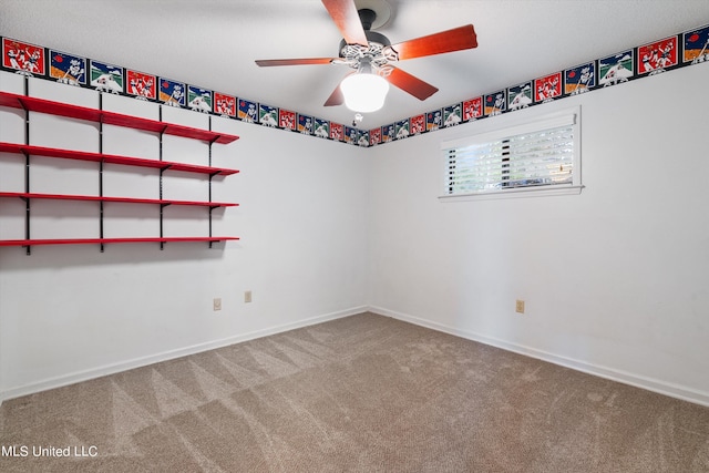 unfurnished room featuring carpet and ceiling fan