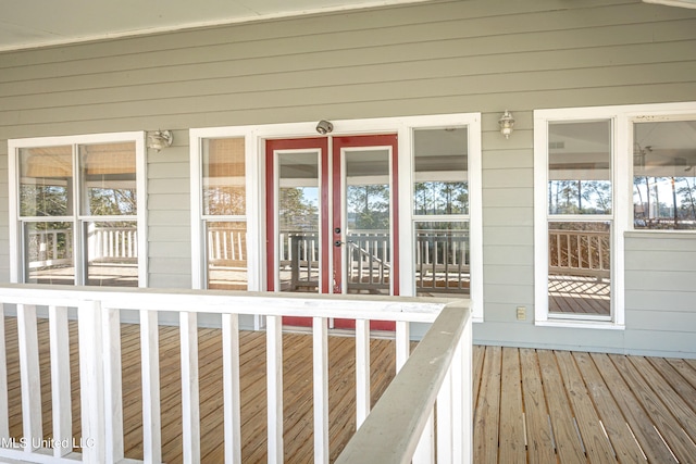 wooden deck featuring covered porch