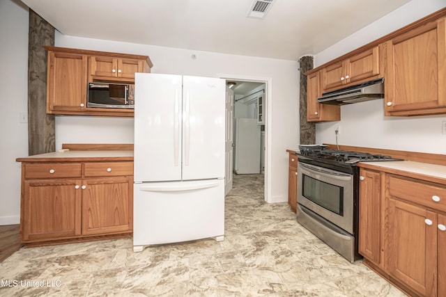 kitchen featuring appliances with stainless steel finishes