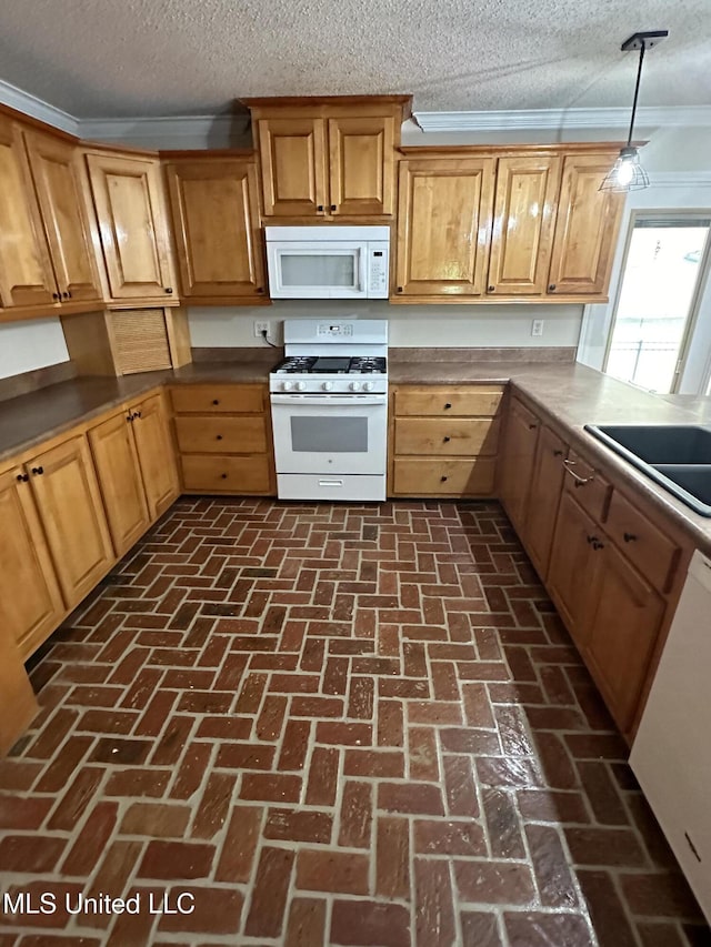 19728 Hwy 63, Moss Point, MS 39562 - kitchen with white appliances, a textured ceiling, crown molding, brick floors, and a sink