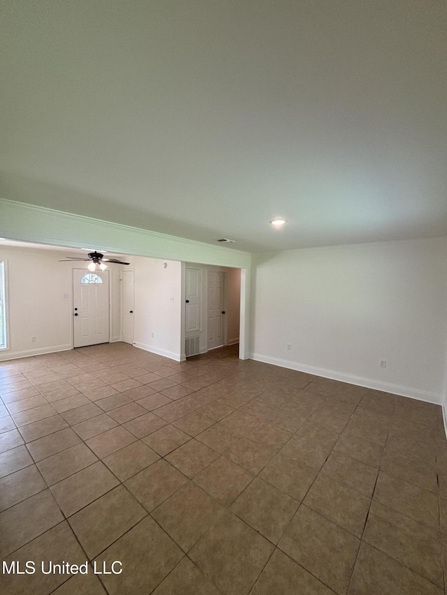230 Greenbriar Cir, Holly Springs, MS 38635 - tiled spare room featuring ceiling fan and baseboards