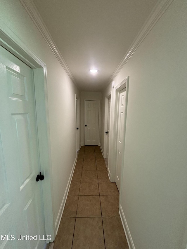230 Greenbriar Cir, Holly Springs, MS 38635 - hallway with baseboards, tile patterned flooring, and ornamental molding