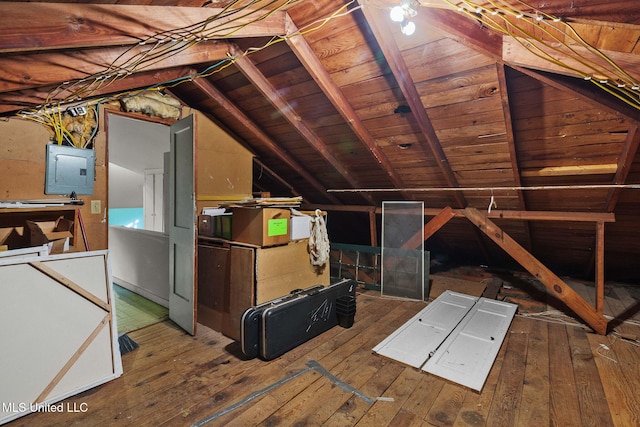 attic featuring electric panel