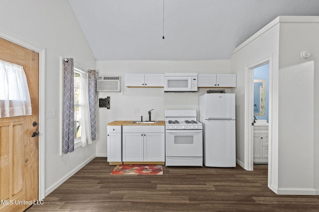 kitchen with lofted ceiling, sink, white cabinets, and white appliances