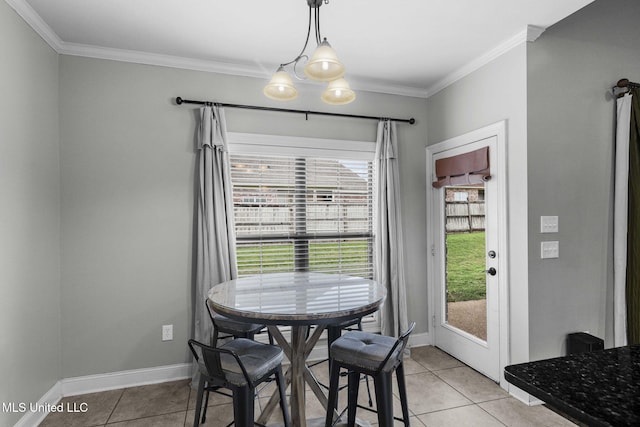 101 Marion Dr, Clinton, MS 39056 - dining area with light tile patterned floors, ornamental molding, a chandelier, and baseboards