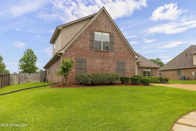 101 Marion Dr, Clinton, MS 39056 - traditional-style house featuring brick siding and central AC unit