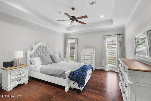101 Marion Dr, Clinton, MS 39056 - bedroom with a tray ceiling, dark wood finished floors, multiple windows, crown molding, and a ceiling fan