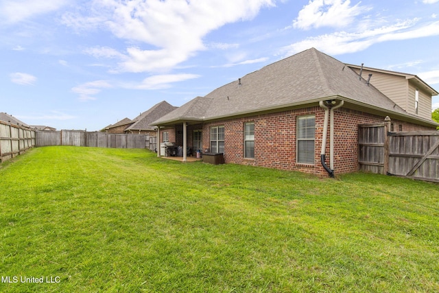 101 Marion Dr, Clinton, MS 39056 - rear view of property featuring brick siding and a shingled roof