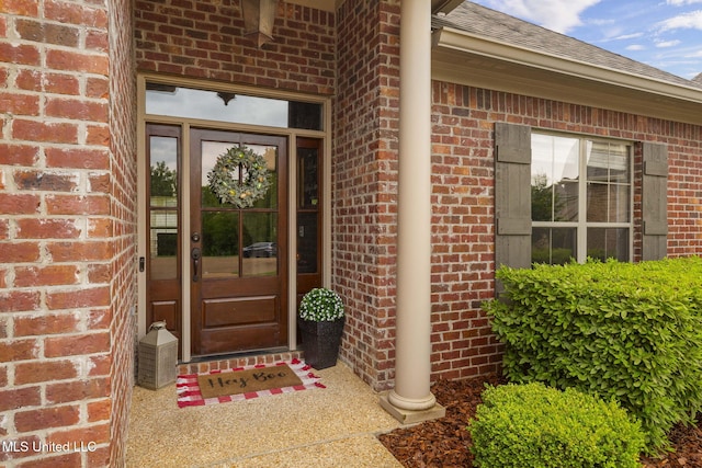 101 Marion Dr, Clinton, MS 39056 - property entrance with brick siding and a shingled roof