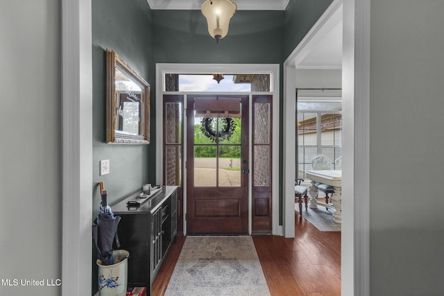 101 Marion Dr, Clinton, MS 39056 - entryway featuring dark wood-style flooring and crown molding