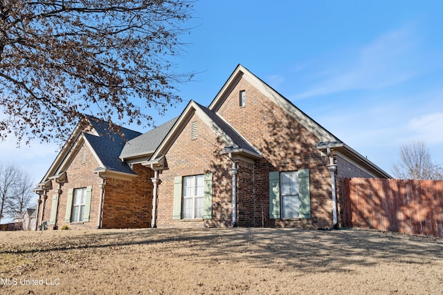 exterior space with a front yard