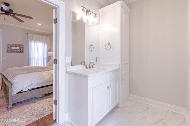 bathroom with vanity, ornamental molding, and ceiling fan