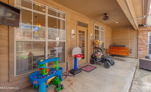 view of patio / terrace featuring ceiling fan