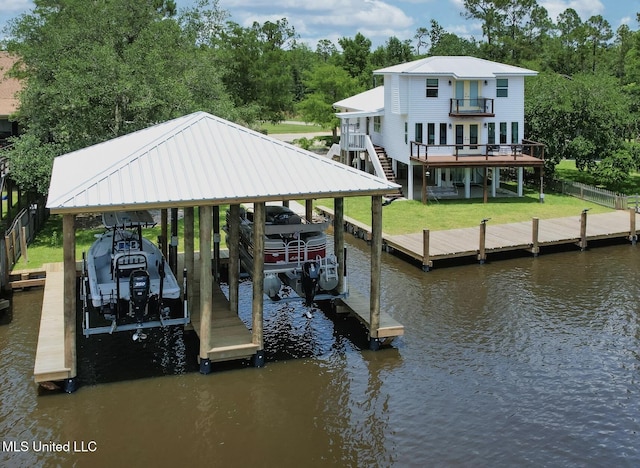 6085 Shawnee St, Kiln, MS 39556 - dock featuring boat lift, a water view, and a balcony