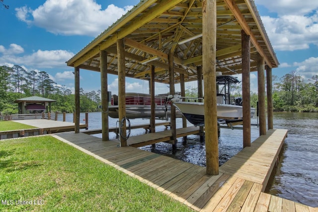 6085 Shawnee St, Kiln, MS 39556 - dock area with boat lift, a water view, a lawn, and a gazebo