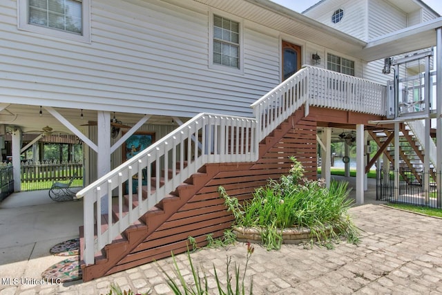 6085 Shawnee St, Kiln, MS 39556 - doorway to property featuring ceiling fan and a patio area