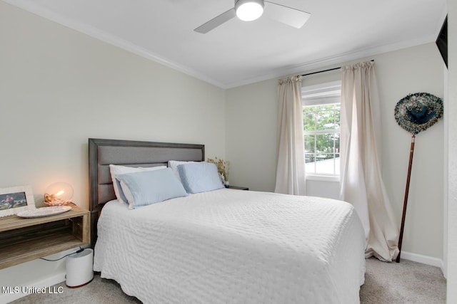 6085 Shawnee St, Kiln, MS 39556 - carpeted bedroom featuring baseboards, crown molding, and a ceiling fan