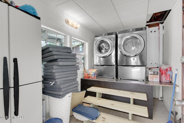 6085 Shawnee St, Kiln, MS 39556 - washroom with independent washer and dryer and tile patterned flooring