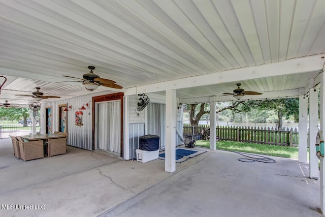 6085 Shawnee St, Kiln, MS 39556 - view of patio / terrace featuring a ceiling fan and outdoor dining space