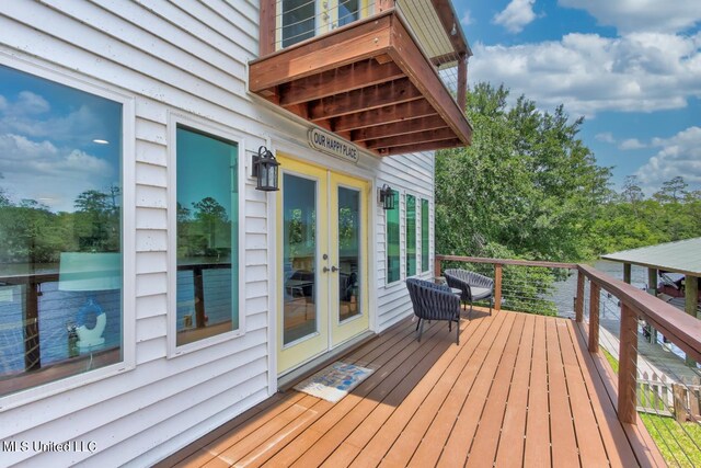 6085 Shawnee St, Kiln, MS 39556 - wooden deck featuring french doors