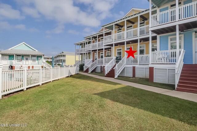 1515 E Beach Blvd Unit 105, Pass Christian, MS 39571 - drone / aerial view with a water view