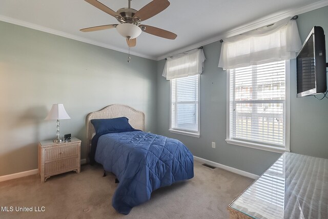 1515 E Beach Blvd Unit 105, Pass Christian, MS 39571 - bedroom with crown molding, light colored carpet, white fridge with ice dispenser, and baseboards