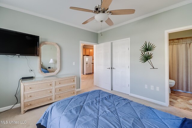 1515 E Beach Blvd Unit 105, Pass Christian, MS 39571 - bathroom featuring vanity, toilet, a shower stall, and ornamental molding
