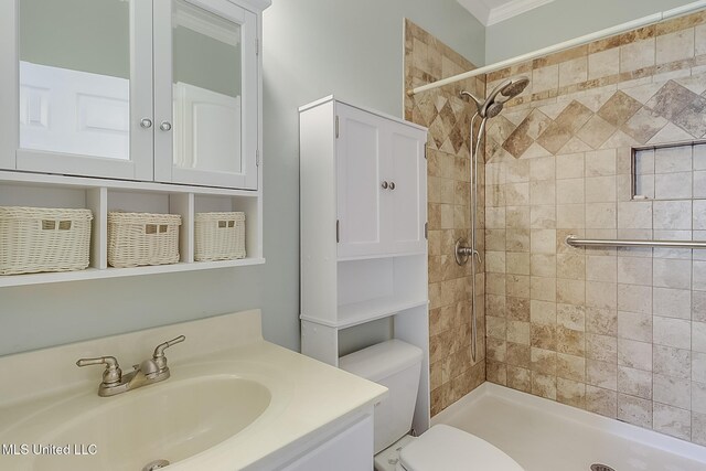 1515 E Beach Blvd Unit 105, Pass Christian, MS 39571 - kitchen featuring a sink, white appliances, light tile patterned flooring, a kitchen breakfast bar, and crown molding
