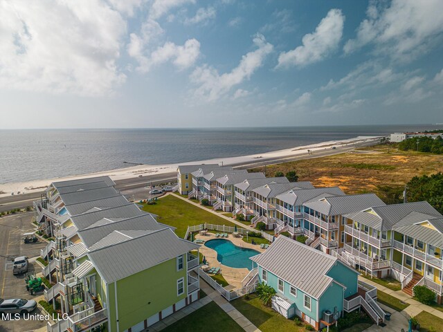 1515 E Beach Blvd Unit 105, Pass Christian, MS 39571 - drone / aerial view featuring a water view