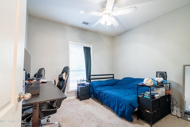 bedroom featuring ceiling fan and carpet floors