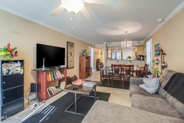 2046 Beach Blvd Unit 321, Biloxi, MS 39531 - tiled living room with visible vents, ceiling fan with notable chandelier, and crown molding