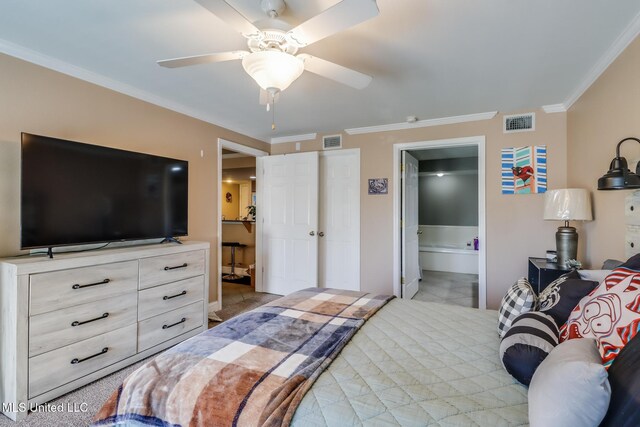 2046 Beach Blvd Unit 321, Biloxi, MS 39531 - bedroom featuring visible vents, crown molding, a ceiling fan, and ensuite bathroom