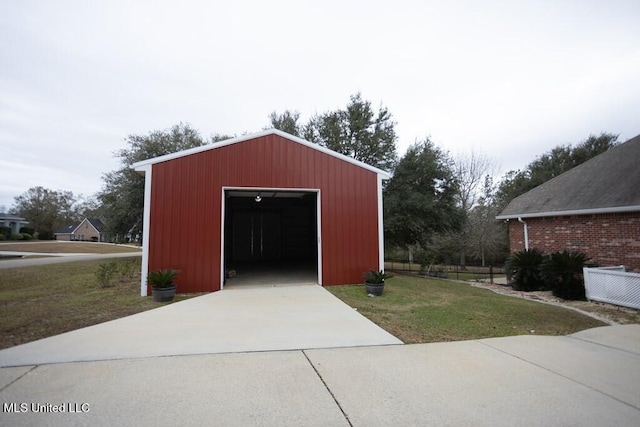 4 Mitchell Cv, Carriere, MS 39426 - view of outdoor structure featuring concrete driveway