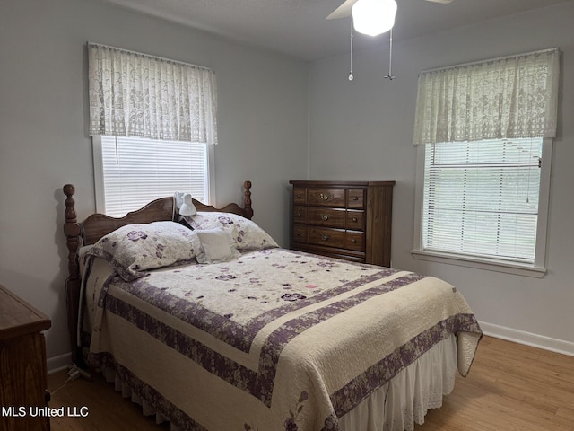 25 Cloverdale Rd, Natchez, MS 39120 - bedroom featuring light wood-type flooring, baseboards, and ceiling fan