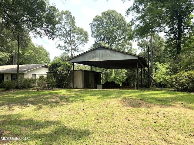 25 Cloverdale Rd, Natchez, MS 39120 - view of green lawn with a carport