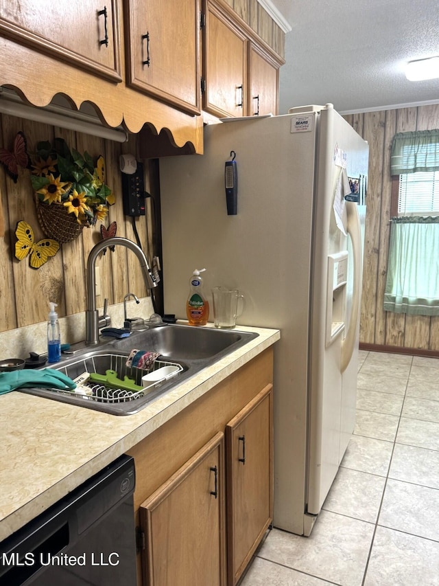 25 Cloverdale Rd, Natchez, MS 39120 - kitchen with a sink, dishwasher, light countertops, a textured ceiling, and light tile patterned flooring