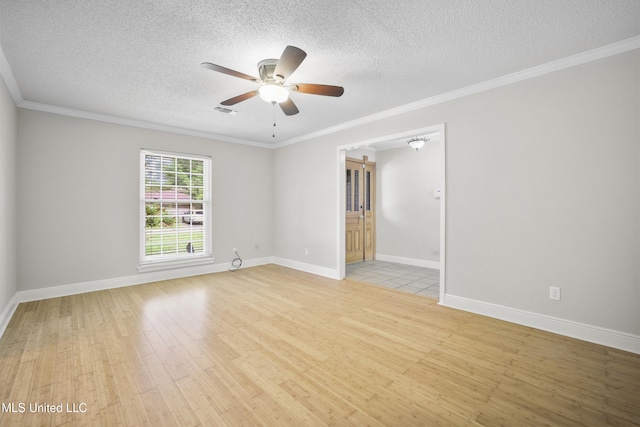 429 Linda Dr, Biloxi, MS 39531 - empty room with light wood finished floors, a textured ceiling, a ceiling fan, and crown molding