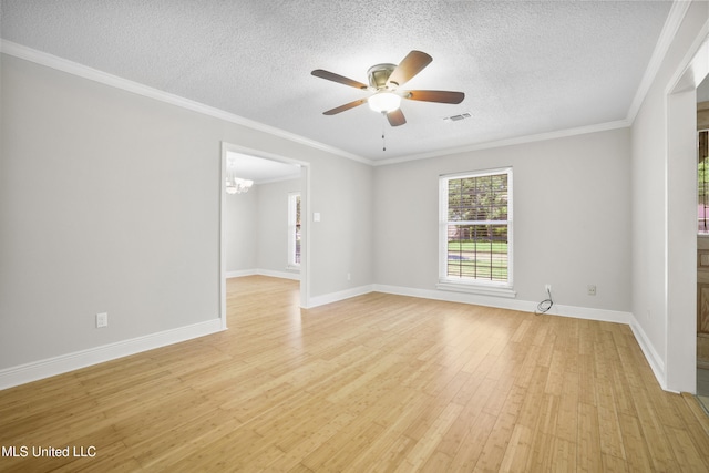 429 Linda Dr, Biloxi, MS 39531 - unfurnished room with light wood-type flooring, ceiling fan, a textured ceiling, a chandelier, and crown molding
