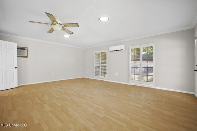 429 Linda Dr, Biloxi, MS 39531 - spare room with a wall mounted air conditioner, a wall unit AC, light wood-style floors, a ceiling fan, and crown molding